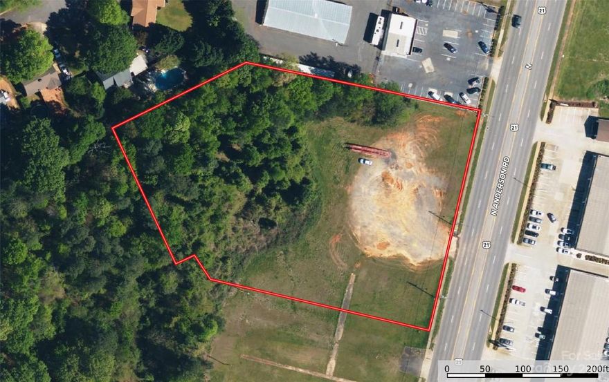 2.58 Acre commercial zoned lot for sale in Rock Hill, SC.  This property is located directly on N. Anderson Road (SC Hwy. 21) and is surrounded by retail, auto dealerships, shopping centers and other commercial businesses.  Land is level with a slight slope to the rear of the property.  Land can be sub-divided.  Seller has preliminary plans to sub-divided the land and listing agent can share those drawings if you like.  Property is convenient to I-77, downtown Rock Hill and Winthrop college.  Seller will sell 1+/- Acre sub-divided parcel for $500k (see MLS listing #4087599)