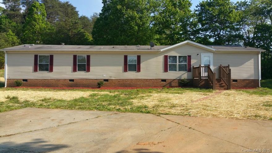 Spacious open floor plan,Home has just been remolded, New paint, Laminate wood flooring, New deck on rear,Spacious rooms offers a jack and Jill bathroom.Beautiful fireplace.