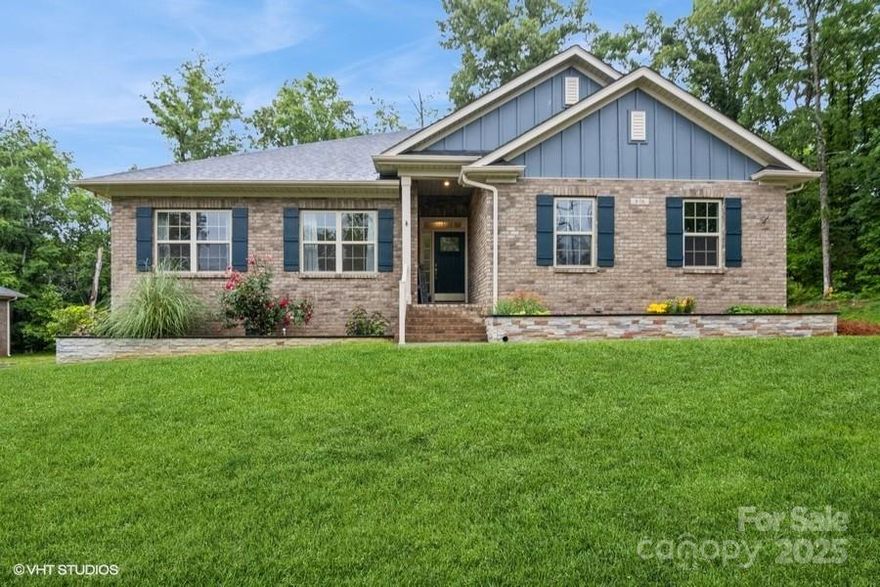 Welcome to this stunning single story former model home! As you step inside, you're greeted by an open-concept floor plan that seamlessly blends modern design with timeless elegance. The tastefully appointed dining room features decorative columns, tray ceiling and crown molding. The oversized kitchen is an entertainer's delight featuring a pantry, granite counters, stainless steel appliances, white cabinets and gorgeous brick-like tile backsplash. Enjoy the upgraded gas fireplace in the sizeable great room. The primary suite is spacious and has a decorative tray ceiling, ensuite bath with step-in shower, separate tub and generously sized walk-in closet. There's even a Jack and Jill bathroom for added convenience. The backyard is a peaceful haven, framed by a canopy of lush trees and the sweet scent of nature. Side load garage and all brick home. 4 Bedrooms/3 full baths. Situated in the popular College Place neighborhood conveniently located near USC-Lancaster. Move-in ready!