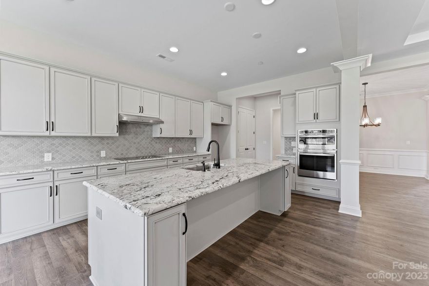 MLS # 4097375 REPRESENTATIVE PHOTOS ADDED. Summer Completion! The Carlyle plan highlights a spacious gathering room, an opulent owner's suite with a tray ceiling, a dedicated study, and four additional bedrooms. As you enter, you'll discover a formal dining room adorned with a tray ceiling, accompanied by a linen and coat closet for ample storage. Moving past the dining room, the gathering room unfolds, with the kitchen and casual dining area to the left and the entrance to the owner's suite to the right. The well-appointed owner’s suite and bath feature a generous walk-in closet, expansive owner's shower, and dual sinks with vanities. The sunroom provides additional living area to entertain or relax after a long day. Upstairs features two additional bedrooms and two bathrooms! Structural options include: tray ceilings, bay window at owner's suite and casual dining, expansive owner's shower, study, sunroom, additional windows, fireplace, and attic suites with additional bath.