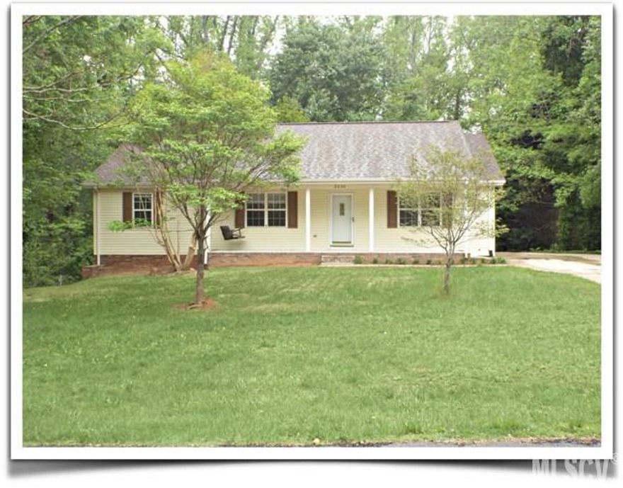 Beautiful Ranch Home with basement for sale in NE Hickory.  Entire 3 Bedroom, 3 Bath home has been freshly painted throughout and includes all new flooring and fixtures.  Eat-in kitchen is light and bright with new appliances.  Large sliding patio doors lead to large deck overlooking fenced-in back yard and creek.  Finished basement includes 2nd living room, a bonus room with closet and connecting full bathroom, plus a 2nd bonus room or office.  Unfinished area is ideal for large workshop or storage area.  New roof, and new furnace & a/c unit in the basement.  Plus many other updates.