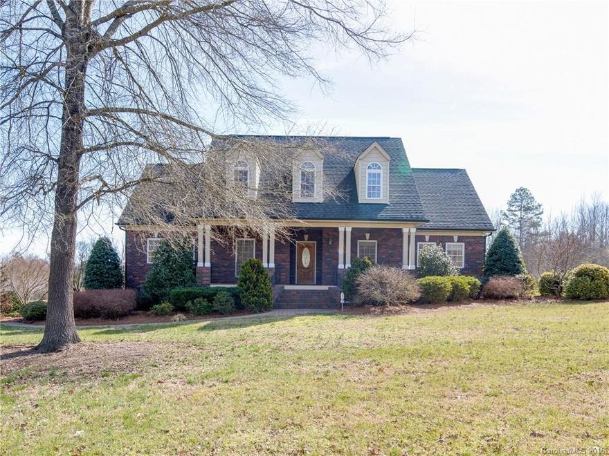 Enjoy the private setting of this professionally landscaped home minutes from 485 and directly across street from Olde Sycamore golf course situated on over 2 acres. Large covered front & back porch, paver walkway/ patio. Gleaming hardwoods through out main floor living area. Freshly painted, new SS appliances, washer/ dryer convey. Master on main, dual walk in closets. Extra large playroom and bonus room/ media room on upper level. Either room easily converted into extra bedrooms if needed.