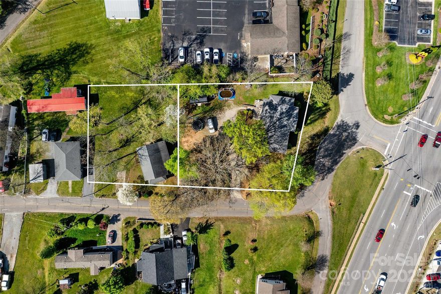 PRIME LOCATION- 2 Houses and 1 unfinished apartment - Located within the city limits of Marion, this unique property (approximate 0.7 acres), is highly visible located near By-Pass, shopping center, minutes from downtown Marion and I-40.  Opportunity you don't want to miss!     This property includes 2 homes and 1 unfinished apartment):  1)  3 bedrooms, 1 bath approximately (1137 sq feet); 2) 3 bedroom, 1 bath, approximately (1039 sq feet); and 3) unfinished apartment approximately (627 sq feet).   City water and city sewer.  This property is zoned R3 now.   Owner talked with Vance at the Planning Development with the City of Marion and he stated there should not be a problem to rezone commercial if application is submitted with plans on the use of said property (application attached to documents).  Take advantage of this opportunity - won't last long!!   Owner is a NC Real Estate Broker.