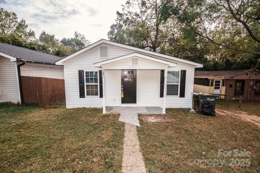 Check out this cute-as-a-button 3-bed, 2-bath one story home in Monroe, NC! This home has been well maintained and was updated in 2019. It has LVP throughout the communal living areas and carpet in the bedrooms. The primary bedroom as an ensuite bath with walk-in shower. The shared bath in the hallway is a tub/shower combination. Home was used as a rental and would be perfect for a first time home buyer, or for an investor looking to increase their portfolio.