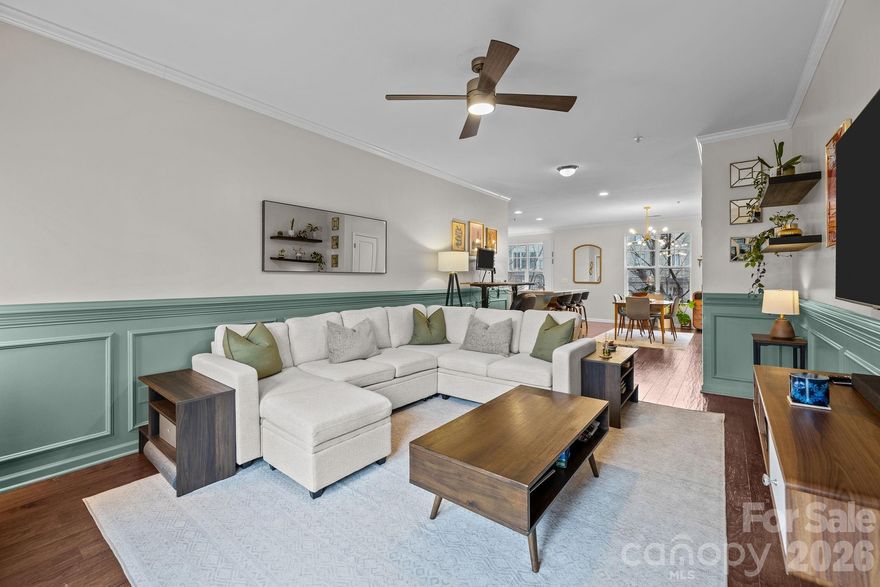 This Weekend Only! Offering $1,000 closing cost credit for any buyer who attends Saturday’s open house from 12:00pm to 2:00pm or schedules a showing and submits an offer by Wednesday at midnight!

Ideally located just minutes from the energy of Uptown, this modern 2 bedroom/2 bath condo combines a prime location with thoughtful, high-end upgrades throughout. Enjoy evenings out on your covered balcony — perfect for morning coffee or evening unwinding — while being just blocks from dining, entertainment and nightlife. Inside, the open-concept layout is designed for both everyday living and effortless entertaining, seamlessly connecting the kitchen, dining and living areas. Designer enhancements elevate the space, including wood flooring, updated lighting and ceiling fans, upgraded hardware, wainscoting in the living room and a beautifully remodeled main level bathroom featuring a dual-sink vanity and a striking tiled walk-in shower with a waterfall shower head. The spacious primary suite serves as a private retreat with a custom accent wall and a closet outfitted with custom built-ins to maximize storage. A generously sized secondary bedroom and full bath are located on the lower level offering privacy and flexibility for guests, a home office or an additional living space (murphy bed included and a separate entrance if you want to use this space as a rental for income!). The indoor HVAC unit was replaced in 2025, and the outdoor has a manufacture date of Feb 2021, offering you peace of mind upon move-in. A spacious attached garage and unbeatable proximity complete this exceptional opportunity for stylish city living!