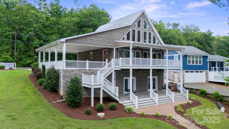 Your Dream Lake Tillery Home in Norwood, NC awaits you!
Discover the ultimate lakeside lifestyle at this magnificent 3-bedroom, 3.5-bathroom residence, perfectly situated on a serene cove just off the main channel of Lake Tillery in Norwood, NC. A nearby marina means endless boating and water sports are always within reach.

Come inside to a chef's dream kitchen with upgraded appliances, custom cabinetry, and a double oven. All the bathrooms have heated floors. This home ensures year-round comfort with two high-efficiency HVAC units and two hot water heaters.

Outdoor living is exceptional. Gather around the inviting fire pit. For RV owners, there's a dedicated motorhome-grade concrete parking pad with an electric hook-up. Plus, your very own double bathhouse, with two lifts, provide ultimate convenience after a day on the lake.

This is more than a house; it's a private sanctuary offering the best of Lake Tillery living. Embrace the happy lake life that awaits you!