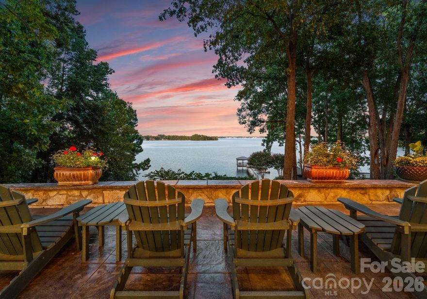 Crown Jewel Of Lake Norman! BREATHTAKING  VIEWS FOR THREE MILES! Cherished waterfront cottage on the pinnacle of Belle Isle. The most sought after address on Lake Norman. Nestled on a private cul-de-sac.Thoughtfully maintained and full of charm. A peaceful retreat with stunning year round deep water lake views and rooms to relax or entertain. Almost an acre lot and 200 feet of pristine shoreline. Oversized laundry room/drop zone. Back staircase to an upstairs bonus/flex space that could easily be an office or home gym. A quintessential grandfathered one bedroom/bath, boat house with kitchen and loft. Beautifully landscaped patios, mature perennial gardens and multiple sitting areas. Expansive waterfront from both the front and back of the house. Over 3700 square foot Cottage/Cape Cod home. Daylight walk out basement, with fireplace, custom built in bookcases, updated bath and lakeside bedroom. Decks, patios on both levels. Outdoor fireplace for cozy evenings lakeside. Outdoor screened in sleeping porch for lazy summers--- or watching football. The potential for this property are boundless!
We can provide preliminary plans and drawings for the property if someone wishes to change the property AND MAKE IT THEIR OWN! Live in it for a while and make changes gradually. The possibilities are infinite.