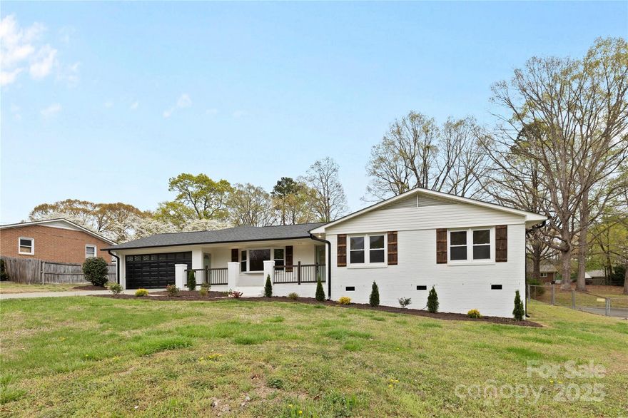 Stunning home just 4 mins from Downtown Kannapolis in a quiet community, 2 mins from Village Park and trail parks. Features 3 beds, 3 full luxurious baths with granite and tile throughout. Gorgeous kitchen with quartz counters and tile backsplash. Attached garage, extra driveway space, plus a large detached garage perfect for car enthusiasts, potential guest house, or more. Enjoy your half-acre lot from the walk-out deck with no HOA restrictions. Additional office space, great family room with natural light. Spacious lot provides privacy and room to expand. Incredible location near parks, the beautiful ballpark stadium, and top-quality finishes throughout. Must see in person to appreciate all the features and potential this home offers!