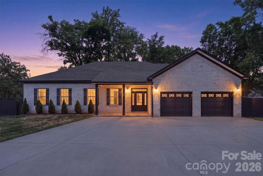 Welcome to this one-of-a-kind, custom-built 4-bedroom, 3-bathroom home, perfectly situated on a level half-acre lot. A circular driveway provides effortless access and abundant parking, setting the tone for both convenience and curb appeal.
Inside, the home is filled with natural light and features an open-concept layout complemented by soaring 10-foot ceilings throughout. The kitchen offers a refined, modern feel with quartz countertops, a brand-new KitchenAid refrigerator, a spacious pantry, and a built-in wine rack—ideal for both everyday living and entertaining. Beautiful wooden beams add warmth and character to the main living areas.
The primary suite is thoughtfully positioned at the rear of the home for added privacy and includes custom his-and-hers closets. Additional highlights include a well-appointed laundry room with a utility sink and a functional layout designed for comfort and efficiency.
Step outside to enjoy the wooden deck overlooking the expansive backyard, complete with a large storage shed for added convenience. The attached two-car garage is fully insulated and offers incredible flexibility—easily convertible into a bonus room or additional bedroom.
Ideally located just minutes from Charlotte Douglas International Airport, The River District, and Bank of America Stadium, this home combines peaceful living with quick access to some of Charlotte’s most desirable destinations.
Don’t miss this rare opportunity to own a truly unique home!