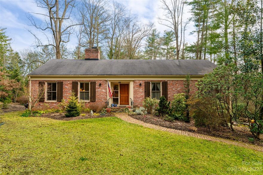 This classic brick ranch-style home in Biltmore Forest presents an idyllic blend of privacy and meticulous care. Boasting three bedrooms and three bathrooms, this residence stands as a testament to modern comfort within a timeless design.
Nestled within the coveted Town of Biltmore Forest, this home caters to convenience, promoting ease of living. A highlight of the home is the spacious screened-in porch overlooking a charming private garden adorned with specimen conifer trees. One of the distinctive
 features of this property is the heated greenhouse, equipped with running water, offering a year-round sanctuary for nurturing plants.
The lower level of the house provides a tandem two-car garage and an expansive workshop, catering to both storage needs and creative pursuits. Additionally, a private entrance leads to a versatile space, ideal as a bedroom, office, or craft room, enhancing
 the home's adaptability to various lifestyle preferences.