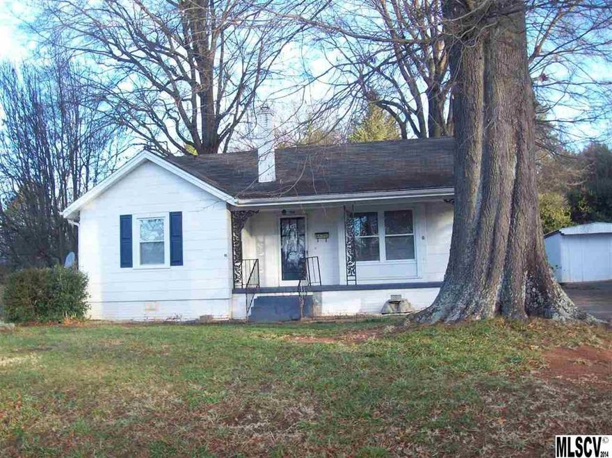Charming 3 bedroom, 2 bath with character!  Hardwoods and arched doorways, over sized windows, glass door handles. Formal dining plus breakfast nook, sizable bedrooms.  Great backyard with large shade trees.  Covered front porch. Roof, kitchen, and baths updated in 2005.  Windows replaced in 2005.  Separate laundry room.