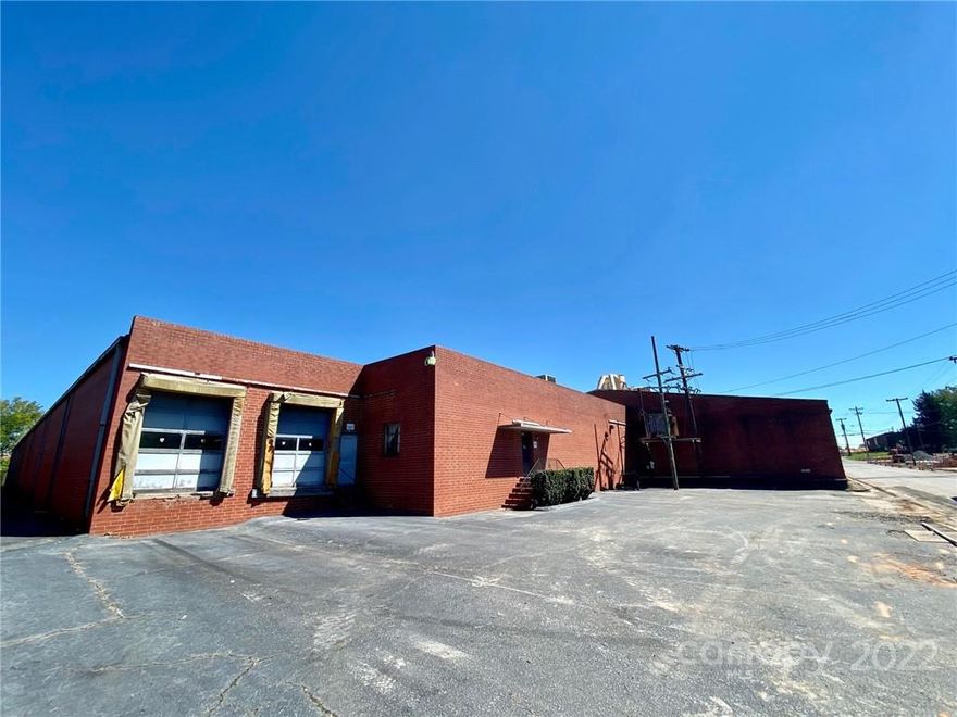 Over 73,000 square feet with high ceiling clearance (13'+), office, and conference space for sale at under $23 per square foot. New roof being installed over about 1/3 of the building.  Currently leased, representing a double digit cap rate at this price.  Property for sale includes 2.14 acres with 73,000 sf+ building and almost half an acre parking lot located directly across the street.  Hickory's impressive new city walk is currently being installed between the building and the parking lot.