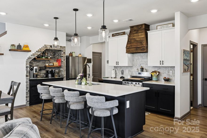 **NOW LISTED AT $385,000!!**
**Qualifies for $2500 towards closing costs with preferred lender**
Welcome to this stunning 2023 home that beautifully blends modern upgrades with timeless comfort! Featuring 4 bedrooms and 3 full bathrooms, this meticulously enhanced property is truly move-in ready. Step inside to a bright, open layout with fresh paint, upgraded lighting, and designer details throughout. The gourmet kitchen steals the show with a gas range, stylish hood vent, touch-activated faucet, quartz countertops, and a custom coffee/wine bar with pot filler—perfect for entertaining. The first-floor guest suite with walk-in shower is ideal for visitors or multi-generational living. Upstairs, the primary suite impresses with a spa-like walk-in shower, dual vanities, and a spacious walk-in closet with custom built-in system. Thoughtful touches include pull-down sprayer faucets in all bathrooms, ceiling fans in every room, and custom cabinetry in the laundry. Enjoy outdoor living at its finest with a sparkling pool, concrete patio, and fenced-in yard that backs up to the community walking trail. The extended driveway, epoxy garage floors, and updated exterior lighting complete this incredible home. Convenient York location with city water and sewer—schedule your showing today!