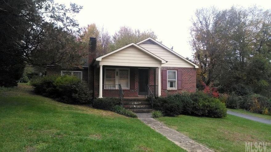 3 bed, 1 bath brick home, one level with basement, carport, on quiet street, priced below tax value. A beautiful home! $54,900