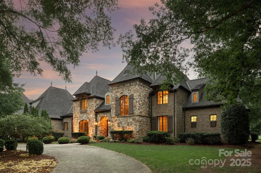 Exquisite French European–inspired estate in sought after gated, Longview Country Club. Set on a private .84-acre lot along the 12th fairway, this custom-built home offers over 8,000 SF of refined living and exceptional golf course views. This exclusive section of Longview is ideal for buyers seeking heightened privacy within the prestigious gated community.

Inside, every detail reflects superior craftsmanship—vaulted and coffered ceilings, rich architectural character, and seamless indoor-outdoor living with dual staircases and elevator access. The chef’s kitchen with dual islands opens to a spacious great room with fireplace and extends to a covered patio with outdoor grilling area and custom fireplace.

The main-level primary suite is a retreat of its own, featuring serene golf views, a spa-like bath, boutique-style closet, private laundry, and coffee bar. Upper levels include all en-suite bedrooms, a billiard room with bar, media /family room, and a third-floor flex suite with elevator access and full bath—perfect for guest or nanny accommodations.

Luxury, privacy, and timeless design converge in this rare Longview offering.