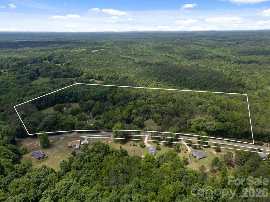 21 acres of opportunity in Chester. Properties offering this amount of acreage, privacy, and long-term potential are becoming increasingly rare as surrounding areas continue to grow.

Tucked away among mature trees, this property features a brick ranch home with approximately 1,716 heated square feet, including 3 bedrooms, 1.5 bathroom, spacious living areas, open kitchen and dining space, and an additional flex/basement-style entertainment room. The home is livable with room for updates and customization. Roof replaced in 2022.

The acreage is truly the centerpiece here — ideal for recreational use, investment potential, homestead living, hunting, expansion opportunities, or simply owning a substantial tract of land in a developing area. A unique opportunity to purchase land with flexibility and future upside.

Property being sold as-is.