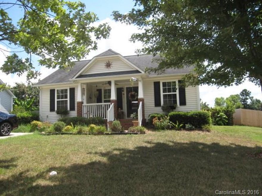 Charming bungalow with an open floor plan and large fenced yard. Front yard is landscaped, back yard is fenced with canopy covered deck that can be enjoyed year round.