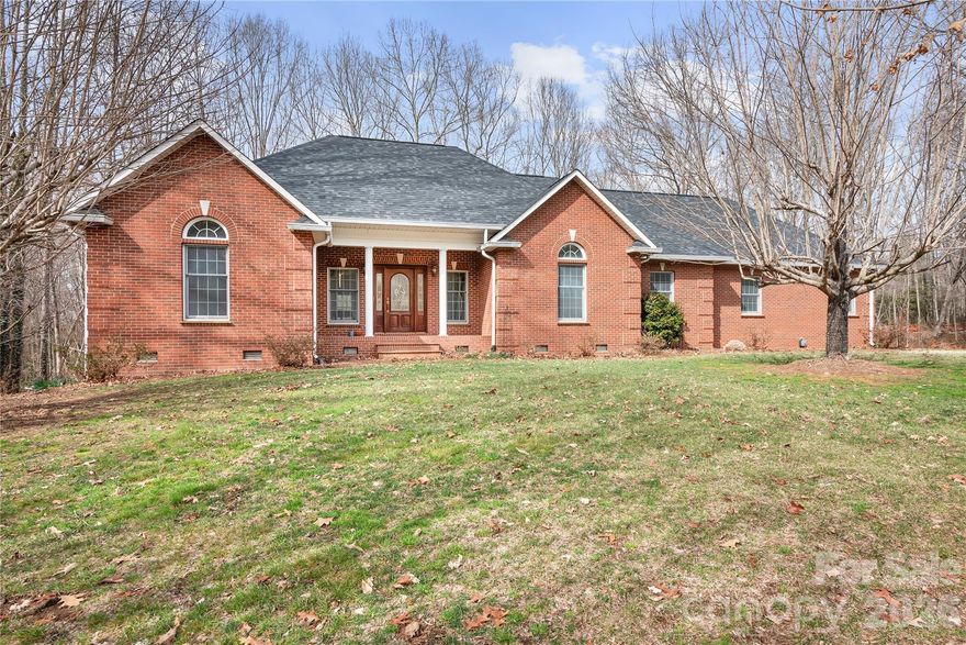 Welcome to this beautiful all-brick home in the desirable Barringer Woods community of Catawba County. Offering over 2,300 square feet of living space, this property sits on an approximately 1.68-acre lot surrounded by mature trees, providing privacy and a peaceful natural setting.

This home is permitted for two bedrooms, with an additional versatile room that could easily serve as a home office, guest room, or potential third bedroom.

Enjoy warm spring days relaxing on the spacious all-brick patio, perfect for outdoor gatherings or quiet mornings with coffee. The property also features a second attached garage, ideal for hobbies, storage, or a workshop.

With plenty of space both inside and out, this home offers comfort, flexibility, and room to enjoy the outdoors while still being conveniently located in Catawba County.