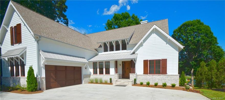 Another master piece by one of Charlotte's finest, Grande Custom Builders. Charm, elegance and beautiful craftsmanship throughout this open floor plan. A private setting with beautiful large oak tress and big water views. Featuring an amazing Chefs Kitchen, Wolfe/Sub-Zero Appliances, custom cabinets, beautiful Quartz countertop on oversized Island, Coffered ceilings and 5" White Oak floors. Owners suit has great water views & amazing master bath featuring a dual rain head walk in shower.