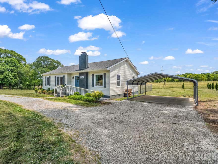 Cozy country living in southeastern Rutherford County. The property has seen numerous improvements by current residence, made to an already new home flip. Located 20 miles from Tryon Resort,  25 miles from Spartanburg, SC. An hours drive from Asheville and from Charlotte. There is a well on the property in the front left side yard. Nice updated country home on 1.14 Acres close to Race Path Baptist church