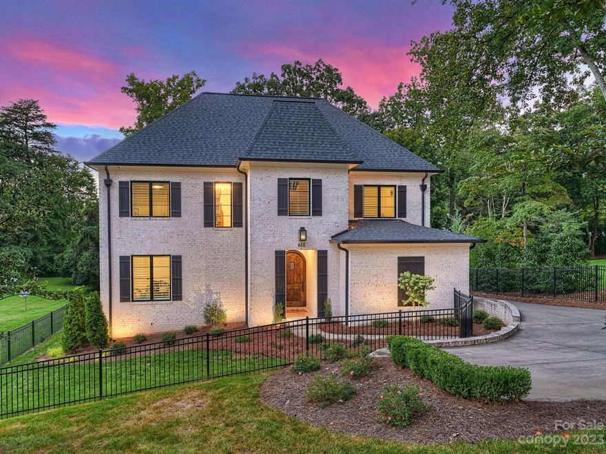 Absolutely beautiful Modern Farm House Style home built in 2018 located in the heart of Downtown Davidson, walkable to shops, restaurants and everything this charming town offers. 6 bedrooms (flexible also as additional office space or an exercise room) 4 full -2 half bath home has a place for everyone!  Take in the evening sunsets around your beautiful courtyard style pool and outdoor entertaining area, including a fire pit, tv area and custom garage door that slides up opening to the kitchen perfect for indoor/outdoor living.  All white recently refreshed kitchen has an oversized island, tons of storage, large walk-in pantry and fantastic mudroom with built-in cubbies.  Primary suite on the main with glass French doors overlooking the pool, enjoy your hot tub all year round.  This home is move-in ready and the perfect place to enjoy the warm summer months whether you are hosting guests or enjoying all that Davidson has to offer.