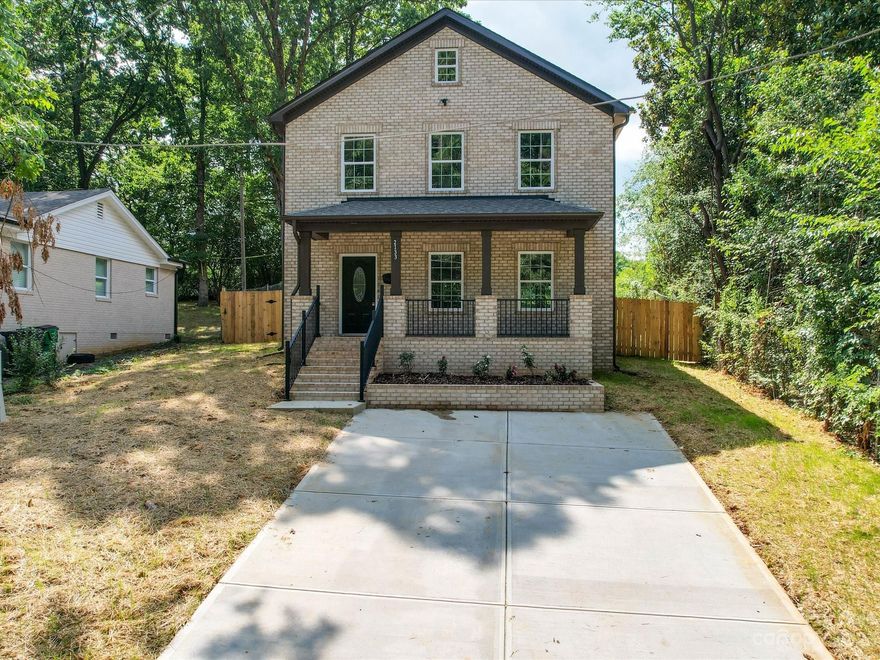 This beautiful brick home is truly a gem, especially considering its rarity at this price point. Its location near Uptown Charlotte offers easy access to various amenities like Camp North End, Optimist Hall, NODA, and Southend. The interior is equally impressive with a spacious modern kitchen featuring shaker style wood cabinets, modern light fixtures, an oversized island, granite countertops, and a stylish backsplash. The elegant moldings add a touch of sophistication, and the recessed lights on the main floor provide the perfect amount of illumination. Upstairs, you'll find the Primary bedroom with an ensuite bathroom, ensuring added comfort and privacy, along with two additional secondary bedrooms.