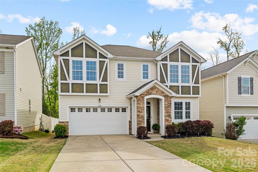 Must-see 4 bedroom, 2.5 bath Tudor-style home situated on a premium lot with a private, tree-lined backyard. Ideally located near everything Lake Wylie has to offer, shopping, dining, and outdoor recreation are just minutes away!
A cozy entryway welcomes you into a bright, open floor plan featuring hardwood floors throughout the main level. The beautifully designed kitchen boasts an oversized island, brand new stainless steel appliances, and a spacious walk-in pantry, perfect for both everyday living and entertaining. A versatile flex room on the main floor makes an ideal home office, playroom, or additional living space.
Upstairs, the luxurious primary suite showcases elegant tray ceilings, dual closets, and a spa-like ensuite bath complete with double vanities, a large walk-in shower, and a relaxing garden tub. Three additional bedrooms and a conveniently located second-floor laundry room provide comfort and functionality for everyday living.
Step outside to enjoy the inviting deck, fully fenced backyard, and flat, usable yard, perfect for gatherings or quiet evenings at home. Located within walking distance to the community pool, playground, and picnic area, this home truly offers the perfect blend of comfort, style, and convenience.