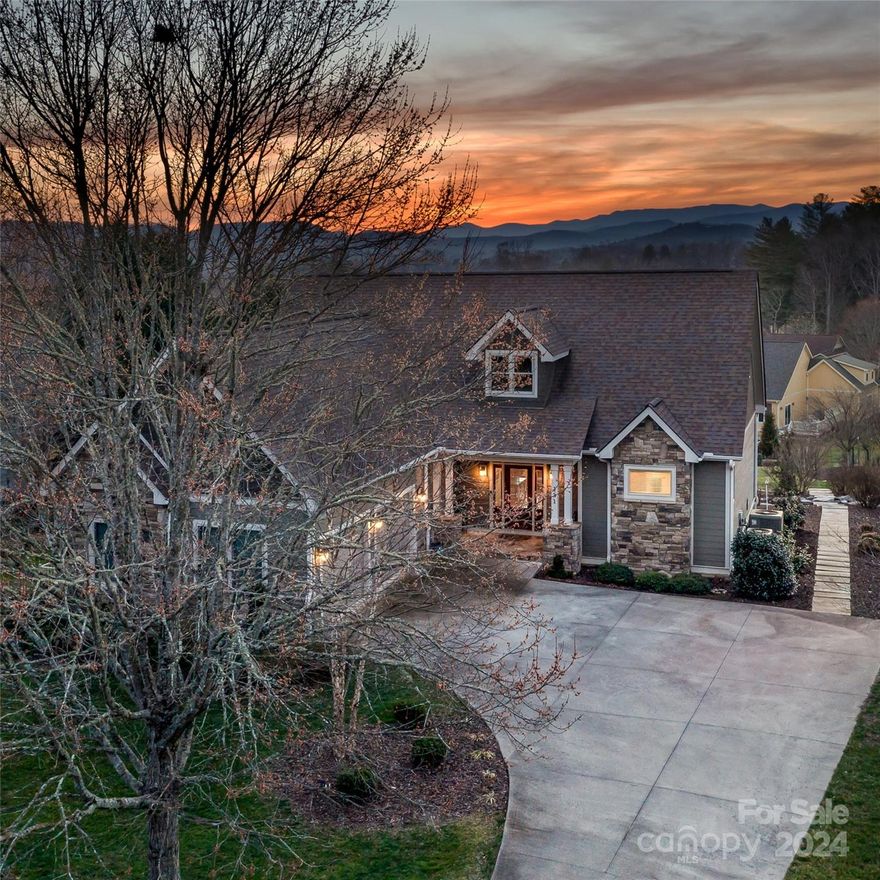 Back on Market! Reason: Buyer's Needed Home Sale Fell Out of Contract but not before a clean inspection of this home was done with all minor issues corrected! View the 360 Virtual Tour & more! Discover this Beautifully Maintained Custom-Built Home with year-round views of the Blue Ridge Mountains. Beautiful 4Br/4Bath master gardener home on a .98-acre lot with a real to life multi waterfalled stream & large pond water feature valued at over $125K!  Come home to this custom masterpiece located inside the renowned Western North Carolina Gated Community of Cummings Cove! A USA Top 50 Master Planned Community since 2013 as rated by Where to Retire Magazine. Google: Cummings Cove. Underground Utilities include Power, City Water, Community Sewer, Natural Gas, Internet! 5 minutes to Major Grocery.  Fire Department & Major Medical Facilities close by! Adjacent to the French Broad River & New 19-mile Ecusta Trail. 15 easy minutes close to Brevard, South Asheville & Downtown Hendersonville.