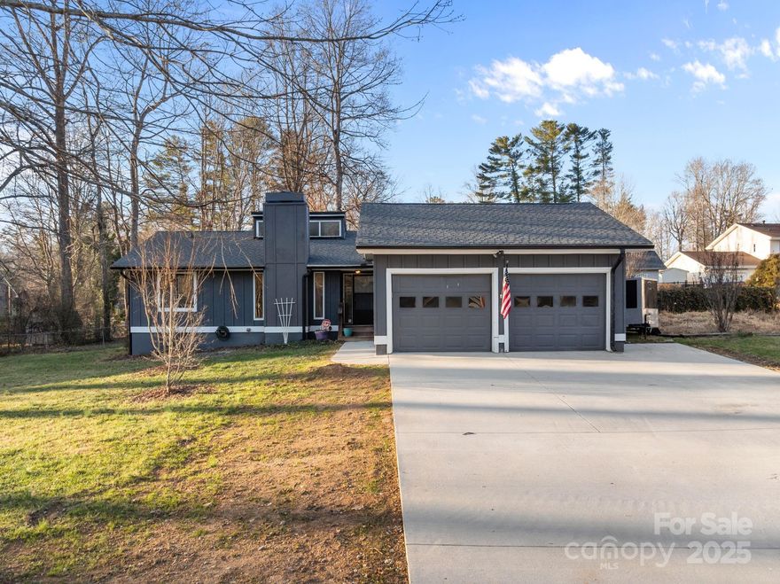 Welcome Home!!!

2026 New Driveway
2026 New Primary Bath
2026 New 2nd Bathroom
2026 New Lighting, New Fans
2025 New Roof
2020 New Heating/Cooling 
New paint, New carpet, New 
Custom Primary Walk-in Closet!!!

• 2 Minutes to Asheville Airport, breweries, Hiking, 2 Minutes to Sierra Nevada, Shopping, Dining, South Asheville, Biltmore Park, Downtown Hendersonville & Downtown Asheville!
Thoughtfully designed living space, this move-in-ready home is perfectly positioned.
This beautifully updated 3-bedroom, 2-bath gem in the heart of Fletcher, NC.
—where comfort, style, and convenience collide.

Step inside to an open-concept layout featuring a large stone fireplace with gas logs in the living room—the ultimate backdrop for movie nights, holidays, and casual entertaining. The 2026 updated/remodeled kitchen steals the show with stainless steel appliances and modern finishes, alongside NEW 2026 bathrooms have been COMPLETELY remodeled for a sleek, spa-like feel. AND Brand NEW 2026 Driveway.

The smart split-bedroom floor plan delivers privacy where it matters most, highlighted by a spacious primary suite with a walk-in closet and a private bath retreat. Need flexibility? The bonus flex space with a charming wood accent wall is ready to be your home office, sunroom, creative studio, or zen zone!

Outside is where the magic continues: a level, fully fenced backyard with a large patio and arbor sets the stage for backyard barbecues, morning coffee, and unforgettable evenings under the stars. Add in a two-car garage with painted floors, plus major upgrades like a new roof, heat pump, and concrete driveway—and you’ve got peace of mind wrapped in serious style.

This isn’t just a house—it’s a lifestyle upgrade!!! in one of Henderson County’s most desirable locations. Blink and it’ll be gone.