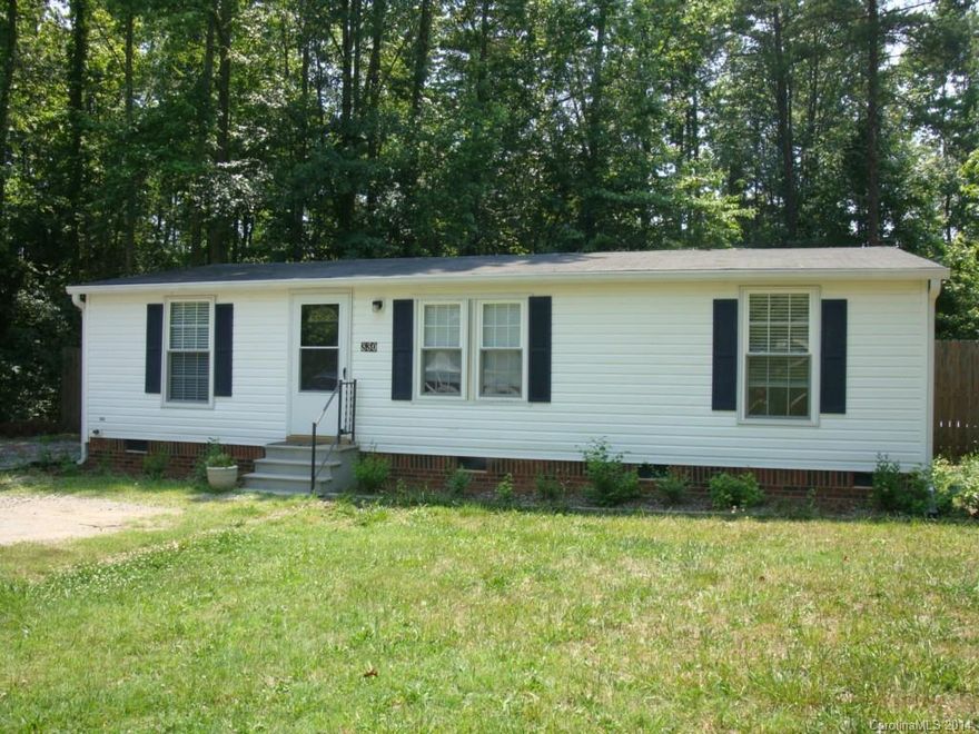 Once inside you are going to really like this home! Wood floors welcome you into the Living room and see how it flows into the Eat in Kitchen, or off the hall to bedrooms 2 & 3 w/full bath. Private Master suite is on other side of Living Room w/full bath and nice size closet! Great Screened Porch, Fenced Yard, Deck & Storage out Back!