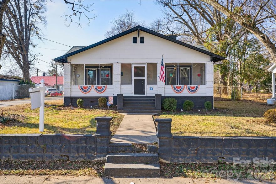 Charming single-family home situated on a spacious .26-acre corner lot just minutes from downtown Gaffney. This 2-bedroom, 1-bath home offers comfortable living with great indoor and outdoor spaces.  Enjoy relaxing mornings on the screened front porch and unwind on the rear patio overlooking the fenced backyard — perfect for pets, gardening, or entertaining. Inside, you’ll find a functional layout with a bright living area and a versatile dining room currently used as an exercise space, easily adaptable to fit your needs.  The kitchen features stainless steel appliances and a stainless steel sink, offering both style and durability. Off the kitchen is an enclosed porch/laundry room.  With its convenient location close to shopping, dining, and local amenities, this home is ideal for first-time buyers, downsizers, or investors.  1-Year Old Republic Home Warranty offered with an acceptable offer.  Call and schedule your appointment today!