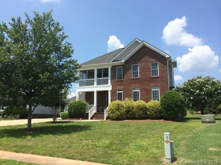 Beautiful home located right across from the neighborhood pond!  Mostly brick with some hardiplank.  This home is ready for new homeowner.  Gorgeous hardwood floors on main level.  Formal dining room, great room with fireplace, spacious kitchen with solid surface counter tops and tons of cabinets.  Lots of natural sunlight pouring into this home!  Detached double garage, rocking chair front porch and screen porch balcony.  Neighborhood also has a pool.  A must see home!