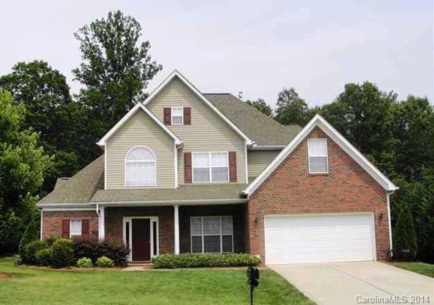 2 story, split floorplan with main floor master and 2nd bed & bath and laundry room.  Master suite with bay windows and trey ceiling, double vanity, separate water room, shower and garden tub and large walk in closet.  2 story great room with gas log fireplace and TV niche above.  Beds 2, 3, and 4 on upper level with Jack/Jill bath.  Mature landscaping with privacy, covered back patio, blinds, refrigerator and storage building.