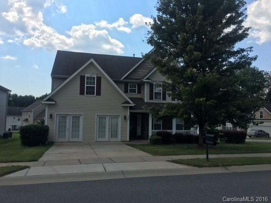 Be impressed with this former model home w/open floor plan, 3300 sq ft and formal living & dining rooms.  The wide entry hall has pre-finished wood floors flowing into the kitchen & breakfast areas; sleek granite, stainless steel appliances an island and bay window in the breakfast nook.  Upstairs is a huge loft w/ an additional sitting area for movie or game gatherings & large master bedroom w/ 2 separate closets and deluxe bath.  Bonus: Separate office/gym w/private entrance & 1/2 bath.