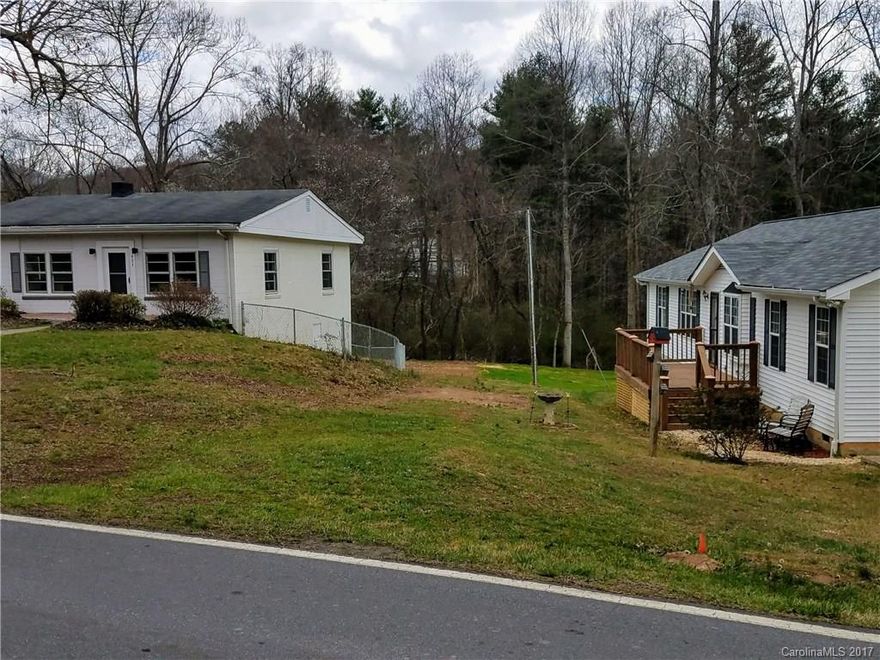 Easy to build lot in Oakley!  Property has been under-brushed and is ready for a builder to arrive. Easy access to a flat buildable lot that is affordable. Why pay City taxes when you can have the convenience of living in town without the expenses.  Easy access to Fairview Road in Oakley or Sweeten Creek to south Asheville.