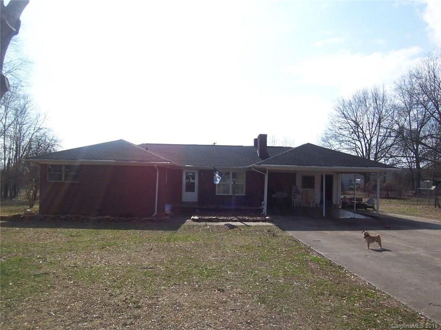 Nice 3-bedroom 2-bath home with large kitchen, fireplace, and hardwood floors. Double attached carport. Convenient location, close to town. Level lot with almost 1 acre.