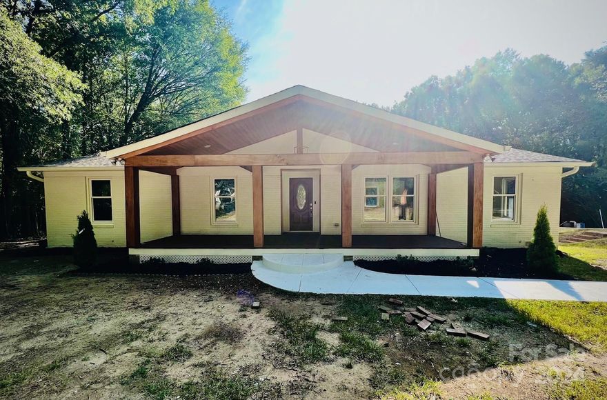 Beautiful ranch Renovated Home Located in Charlotte! 3Bd/2Ba with alot of Square feet. Nice Sized Kitchen. Stainless steel Appliances. Fresh paint inside and out, New Floors, New Roof, New Driveway. INGROUND POOL Beautiful front Porch. Very Private! Level Lot! Prime Location! Close to 485,. New Retail Shopping & Restaurants. Great for short or long  term rentals or to make it your home.