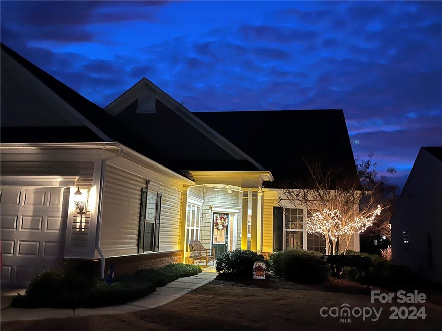 Welcome to this lovely home w/beautiful views of the 8th hole of Carolina Lakes Golf Course! Relax in the airy & open Surrey Crest floor plan. Enjoy the covered front porch, open flowing plan, extensive millwork, crown moldings and hardwood floors! The spacious Great Room features a gas Fireplace w/stone hearth and a sunroom- surrounded by windows and golf course views! A lovely patio & pergola-perfect for watching golf and reading a great book! Gourmet kitchen w/serving bar, tile backsplash, granite counters, island and nice storage! Stainless refrig & lovely breakfast area! Home office/Den with glass french doors & a large Primary bedroom w/elegant tray ceiling and triple windows overlooking the golf course. The SPA bath- dual sinks/plethora of counter space, separate shower, soaking tub and large W-I closet. Split bedroom floor plan for privacy for the main level guest bedroom. Laundry w/cabinetry, sink & dropzone.. Upper level features a HUGE bonus and bedroom suite! Welcome Home!