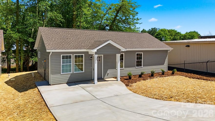 Now offering $5000 in Seller Paid Closing Costs! Welcome HOME to this beautiful new construction one-level home located in close proximity to work, shopping and medical centers!

Step onto the covered front porch and enter an inviting open-concept living space that flows seamlessly into the kitchen and dining area. This modern home features durable luxury vinyl plank flooring throughout, creating a stylish and low-maintenance living environment.

The kitchen offers both style and functionality with white shaker cabinets, granite countertops, and stainless steel appliances, making it perfect for everyday living or entertaining.

This thoughtfully designed layout includes 3 bedrooms and a spacious laundry room conveniently located near the bathroom. The primary bedroom features its own private vanity with granite countertops, accessed through a pocket door for added convenience.

Eligible buyers may qualify for First-Time Buyer Down Payment Assistance programs, helping make homeownership more affordable.

Investors take note: This property offers excellent income potential, making it a strong opportunity for a rental investment.

Don’t miss the chance to own a brand new, low-maintenance home with modern finishes and strong investment appeal!