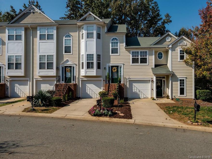 Move in Ready townhouse in beautifully maintained Gated Community minutes from Uptown! Easy access to 85, 77 & 485! Dining room w/ bay window. Open to kitchen. Hardwoods in foyer and dining room. Great Room with cozy fireplace and bookcase. Decorative niche in GR perfect for TV. Master suite with dual vanity and garden tub. Sit on your deck over looking wooded area or lower patio and enjoy no neighbors behind you! Privacy Fence. Hallway repainted. Furniture is negotiable. Light Rail coming soon!