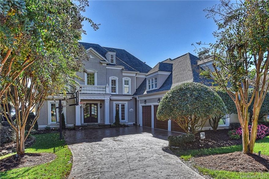 Exquisitely appointed waterfront home renovated by Augusta Homes. Spectacular Lake Norman views & classic style includes coffered ceiling, cast stone hearth & extensive millwork. Open chef's kitchen with marble counters & professional appliances. Guest suites on all three levels. Lower level also has great room, 2nd kitchen & library. Exceptional outdoor entertaining - lakeside pool & spa, stone fireplace, gazebo w/kitchen, new pier. Preferred location & short walk to the Peninsula Yacht Club.