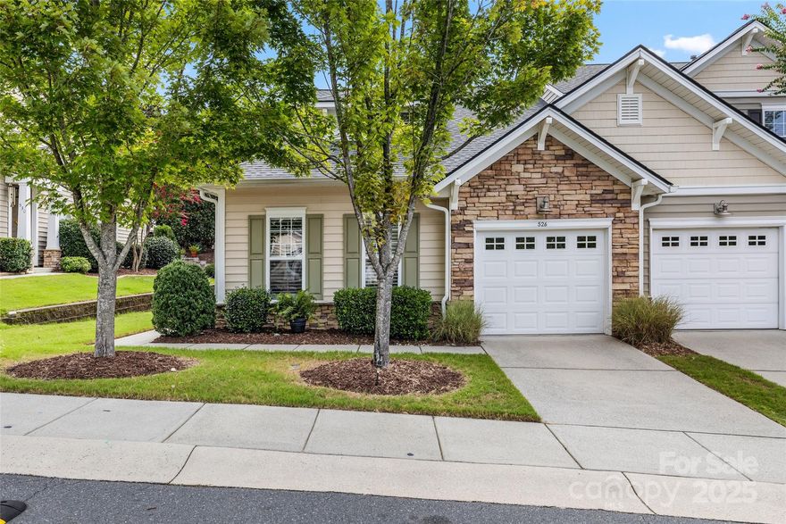 Gorgeous End-Unit Townhome in Calloway Village! This immaculate 2-bedroom, 2-bath home features 10' ceilings and an open floor plan. The great room impresses with a vaulted ceiling and cozy gas log fireplace. The primary suite offers a tray ceiling, spacious walk-in closet, and a private retreat feel, including a luxurious bathroom, a walk-in shower with semi-frameless glass enclosure. A versatile bonus space off the laundry area makes an ideal home office, hobby room, or flex space. Luxury vinyl plank flooring and plantation shutters throughout add timeless elegance. Enjoy morning coffee on the private patio overlooking a tree-lined rear yard. Additional features include an attached 1-car garage and a seller-paid one-year home warranty for added peace of mind. As a Tega Cay resident, you’ll enjoy resort-style amenities—golf, marina, beaches, pool ($100/year), tennis, and more. Don’t miss the opportunity to call one of Tega Cay’s most desirable communities home!