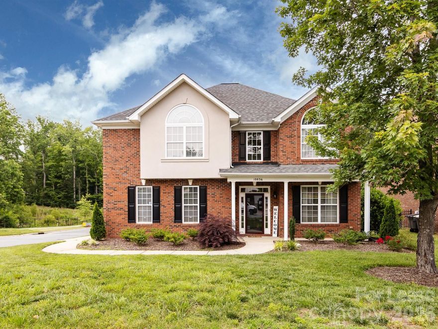 Impeccably maintained full-brick home in a prime Davidson location with easy access to Huntersville, Concord and Charlotte. Features include 9ft ceilings, updated LVP flooring, and an open living room with gas fireplace. The updated kitchen offers stainless steel appliances and opens to a sunny breakfast area and large, freshly stained deck—perfect for entertaining. The spacious primary suite includes a private sitting area/flex space and a spa-like bath with soaking tub, double vanity, and water closet. Vaulted ceilings in secondary bedrooms add charm and space. Extras include a large shed, newer HVAC, Nest thermostat, and updated fixtures throughout. Move-in ready and full of character!