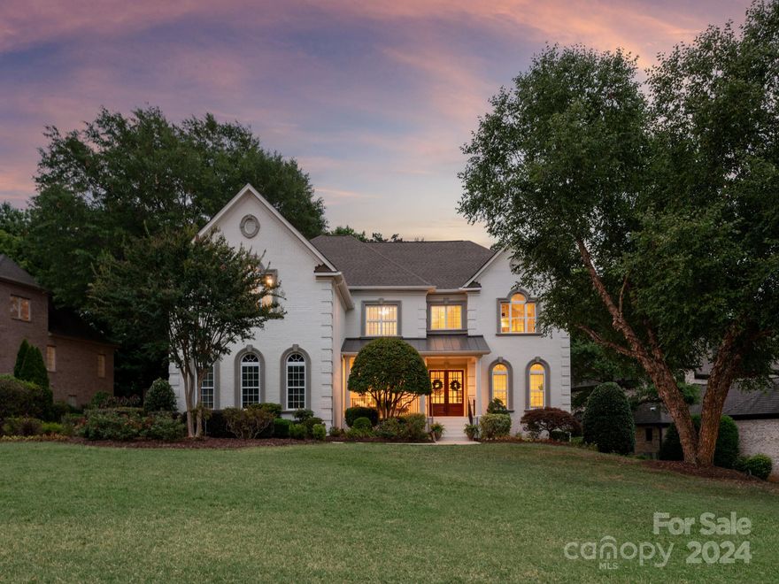 Welcome to 1613 Lookout Circle, an upscale home located in prestigious, gated Providence Downs South. This stunning property boasts 7 bedrooms, 6.5 bathrooms, on 3 floors with a walkout basement all while preserving the timeless farmhouse character.  The living spaces are oversized throughout. The open floorplan seamlessly flows into a light filled chef's kitchen featuring timeless white cabinetry, a gas cooktop, marble backsplash, and soaring ceiling w/ oversized windows bringing the outside in. The saltwater pool and heated spa are complemented by multiple outdoor seating and entertaining areas. The main level has a guest suite w full bath.  The upper level houses oversized primary wing and 4 additional bedrooms with attached baths.  Third level offers private bedroom w sitting area and full bath.  Basement is open for large gatherings and includes a bedroom and endless storage!  PDS has world class amenities: clubhouse, tennis, basketball, pool, playground and neighborhood pond.