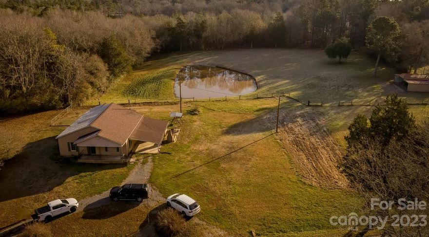 Nestled on a sprawling 4-acre parcel of land, this charming property presents a rare opportunity for investors seeking a picturesque retreat. Situated amidst nature's beauty, this serene oasis boasts a stocked pond that's perfect for fishing enthusiasts and those seeking a peaceful escape.

The cozy yet spacious residence features 2 bedrooms, offering a comfortable and inviting living space.

Step outside to discover the breathtaking beauty of the expansive grounds. The centerpiece of this property is the well-maintained stocked pond, inviting you to spend leisurely hours fishing or simply enjoying the tranquil ambiance. The lush greenery surrounding the pond creates an enchanting setting for relaxation and unwinding.  Home is being sold “AS IS”