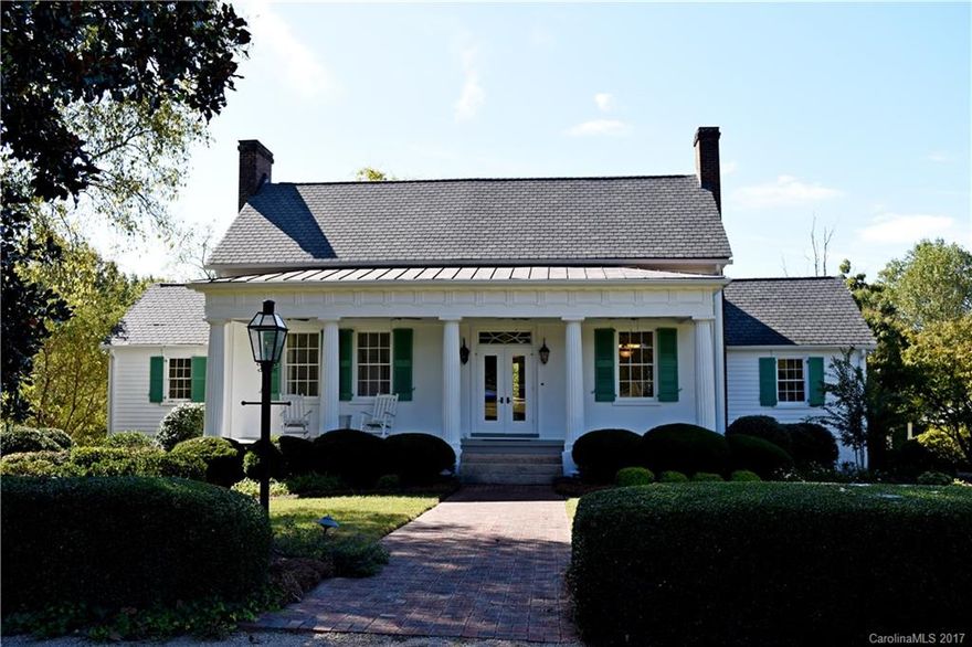 A spectacular 15.24 acre private, Historic property named Mill Hill Plantation, Concord, NC, Cabarrus County! Renovated & Updated! Finest quality construction and finishes: heart pine wood floors, gorgeous moldings, mantels, detailed tile work, custom cabinetry. Boasts parlor, hall, front & back Greek-style porticos, eat-in kitchen w/keeping room that opens to brick patio w/outdoor cooking station overlooking pond. Master on Main has sitting area & balcony w/garden views! Close to CMC-Cabarrus!