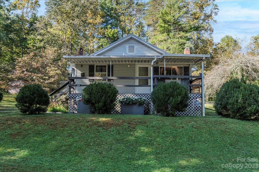 Updated and move-in ready home, conveniently located near Lake James and downtown Marion. The open floor plan offers a large butcher block eat-in island with storage, new granite countertops, custom cabinets, stainless steel appliances, farmhouse stainless sink, and wine fridge. If that's not enough, refinished original hardwood floors, updated bathroom vanities and flooring, new light fixtures throughout, new flooring in laundry room, new metal roof, hot water heater and ADT security system.  Outside area offers a large yard with mature landscaping, fruit trees, storage shed, pea stone patio with firepit, garden areas, covered front porch and extra parking.
Additional vacant parcel across the street is included - see pin #171213031686. Additional 168 heated square feet not included in total HTL due to ceiling height being slightly less than 7 feet.