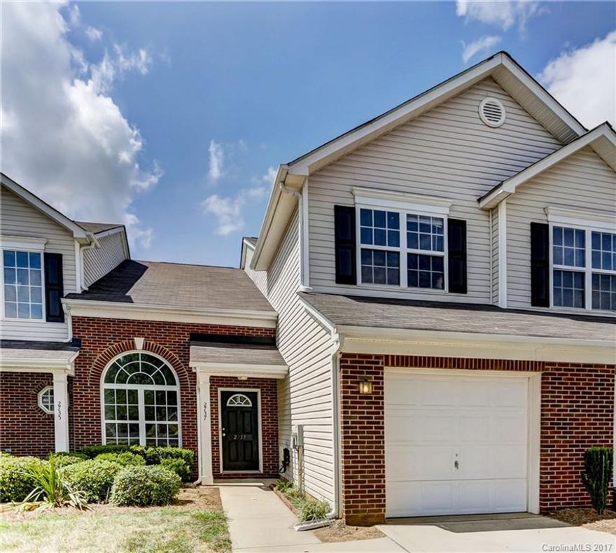 MUST SEE LOVELY bright and open 2 story townhome. 2 story great room and dinning w/hardwood floors. 3 spacious bedrooms. 2 master suites with 1 of the masters down. Wonderful open loft and large laundry room. Lots of storage. bright kitchen w/breakfast area and sliding glass doors to private large patio with a very short walk to the pool! Ceil. fans throughout. Garage w/ opener and shelving. Great home to call your own!