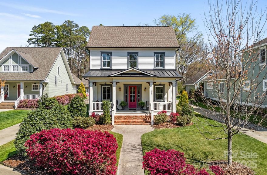 Charming and ideally located, this 4 bedroom 4.5-bath home is in the heart of downtown Davidson.  It features a primary suite on the main level and three bedrooms upstairs. The open plan design kitchen, great room, and dining area is perfect for entertaining. Enjoy a private office on the main level for days working from home. The backyard offers a covered porch with lounge and dining space.  Step down onto the stone patio which features a fire pit and bar with grill area. Above the two-car garage find a room used as a bedroom and a full bath, ideal for rentals. Host parents visiting Davidson College (a short three-block walk), or travelers enjoying local restaurants. The home is close to all highly sought after Davidson schools. It is centrally located within walking distance to shopping, groceries, an array of dining options, and 2 parks. The I77 corridor is just minutes away. This home blends charm, functionality, and an unparalleled location, the best Davidson life has to offer.