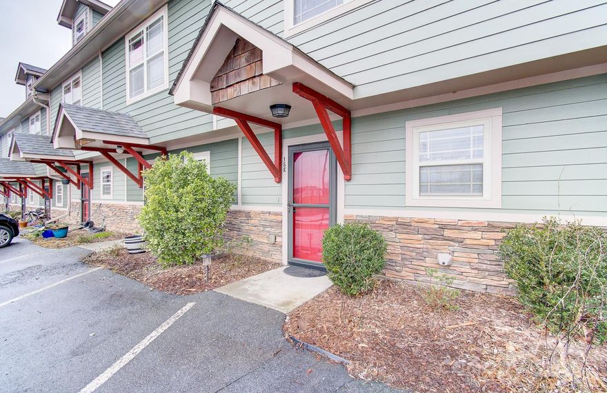 Recently updated with thoughtful touches throughout, this well-maintained 2-bedroom, 2.5-bath townhome is truly move-in ready and designed for easy, low-maintenance living. Improvements include fresh interior paint throughout, new upstairs flooring, downstairs flooring added in 2021, updated bathrooms, a new roof (2022), and fresh exterior paint (2022). Each bedroom features its own private en-suite bathroom, offering excellent privacy and convenience. Step outside to a quiet patio overlooking a peaceful creek—perfect for relaxing or entertaining. Conveniently located near Clyde Erwin Middle and High School, West Buncombe Elementary, and just minutes from New Leicester Highway shopping and dining, with downtown Asheville only 15 minutes away. Long-term and short-term rentals are permitted, making this a rare and flexible opportunity.